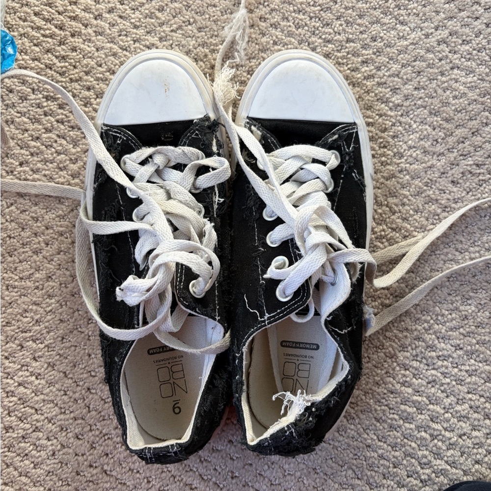 Customized distressed black shoes